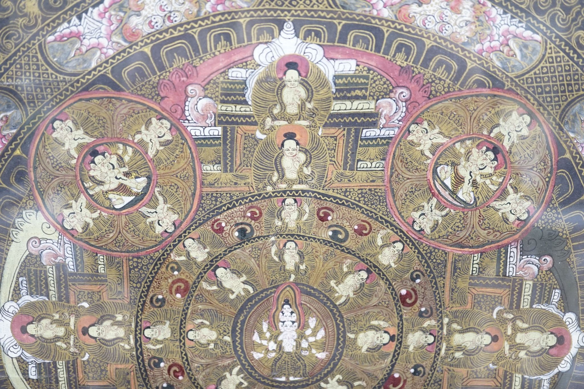 A painted thangka., 35 cms wide x 46 cms high.